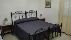 Postel nebo postele na pokoji v ubytování Kali Nitta Salento + 5 fotografií