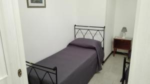 Postel nebo postele na pokoji v ubytování Kali Nitta Salento