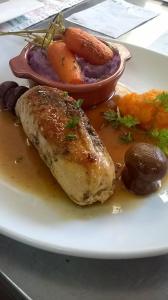 a plate of food with meat and vegetables on a table at Hôtel restaurant HENRY in Puy-lʼÉvêque +5 photos