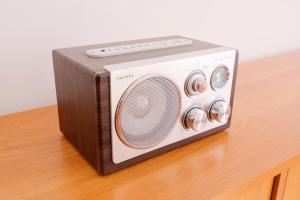 a small radio sitting on top of a table at Terasa Capajevova 6 Kosice in Košice