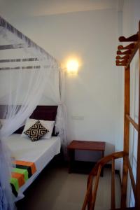 Ein Bett oder Betten in einem Zimmer der Unterkunft Sun sea guest home