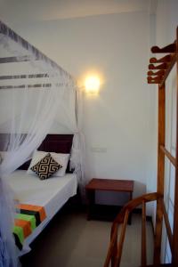 Postel nebo postele na pokoji v ubytování Sun sea guest home