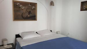 Postel nebo postele na pokoji v ubytování Apartments Vila Ida