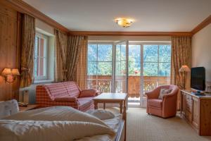 Posezení v ubytování Ruhehotel & Naturresort Rehbach - Adults only