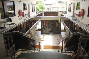 a view from the top of a staircase in a building at Rachel's Apartments in Paramaribo