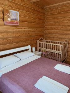 Posteľ alebo postele v izbe v ubytovaní Cottage Simka