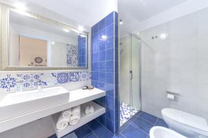 A bathroom at QuattroCuori Boutique Hotel & Spa