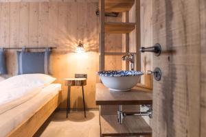 Posteľ alebo postele v izbe v ubytovaní ArlBerglife Ferienresort