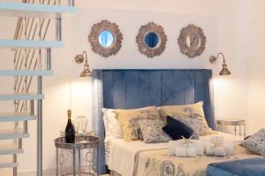 A bed or beds in a room at QuattroCuori Boutique Hotel & Spa