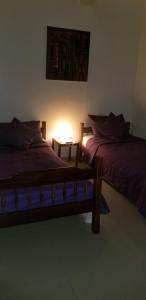 Ένα ή περισσότερα κρεβάτια σε δωμάτιο στο Appartement Confort Fann hock