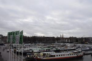 a bunch of boats are docked in a harbor at MPS Flora in Amsterdam