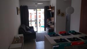 Uma área de estar em Apartamento Villa di Fiore (novissimo)