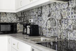 מטבח או מטבחון ב-Talos Luxury Suites