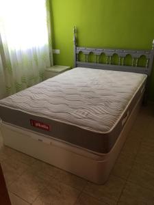 Postel nebo postele na pokoji v ubytování Estoril