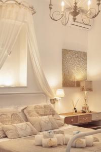 A seating area at QuattroCuori Boutique Hotel & Spa