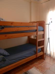 Krevet ili kreveti na sprat u jedinici u okviru objekta -3-COMO EN CASA, en centro historico de Ubeda
