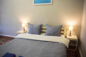 Posteľ alebo postele v izbe v ubytovaní Art apartment on Rynok Square