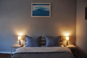 Posteľ alebo postele v izbe v ubytovaní Art apartment on Rynok Square