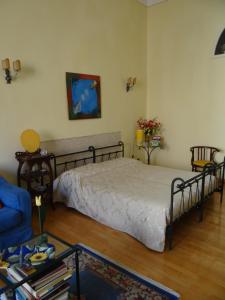 Ένα ή περισσότερα κρεβάτια σε δωμάτιο στο Residenza al Fillungo