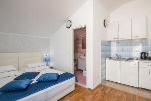 Posteľ alebo postele v izbe v ubytovaní Villa Voinic 2