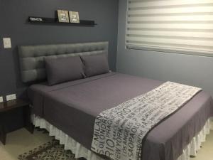 Giường trong phòng chung tại PP suite