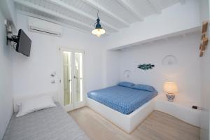 Katil atau katil-katil dalam bilik di Villa Casa Dodo Mare