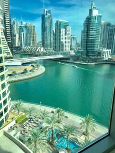 a view of a city with a river and buildings at Park Island, Dubai Marina in Dubai