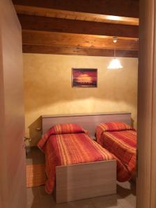 Posteľ alebo postele v izbe v ubytovaní B&B Melius