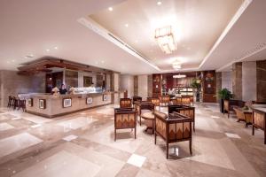 Uma área de estar em Stella Di Mare Dubai Marina Hotel