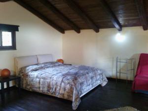 Postel nebo postele na pokoji v ubytování Chalet Etna
