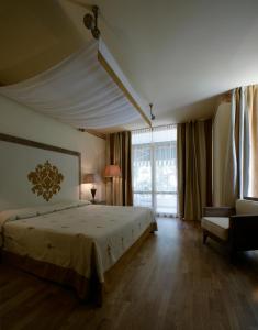 מיטה או מיטות בחדר ב-Hotel Greif