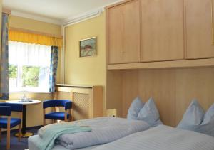 Postel nebo postele na pokoji v ubytování Gästehaus Golker