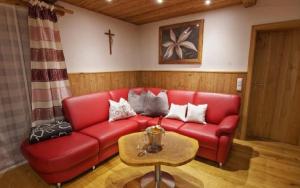 Posezení v ubytování Holzhaus Lugerhof