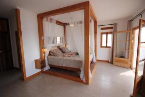Voodi või voodid majutusasutuse Hotel Casa Evora - luxury and beach front toas