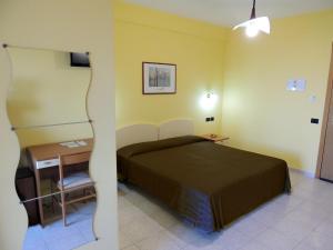 Postel nebo postele na pokoji v ubytování B&B Angela