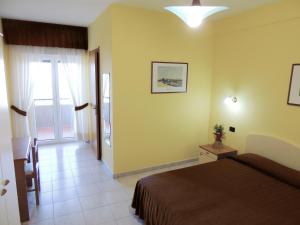 Postel nebo postele na pokoji v ubytování B&B Angela