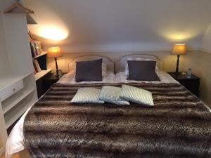 Postel nebo postele na pokoji v ubytování Le Vert Logis