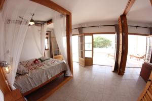 Postel nebo postele na pokoji v ubytování Hotel Casa Evora - luxury and beach front