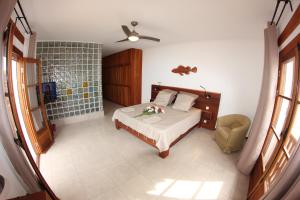 Voodi või voodid majutusasutuse Hotel Casa Evora - luxury and beach front toas
