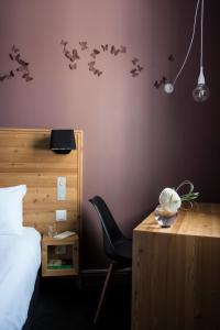 Postel nebo postele na pokoji v ubytování Mon Hotel à Gap