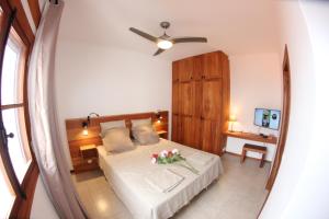 Voodi või voodid majutusasutuse Hotel Casa Evora - luxury and beach front toas