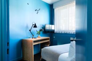 Postel nebo postele na pokoji v ubytování Mon Hotel à Gap