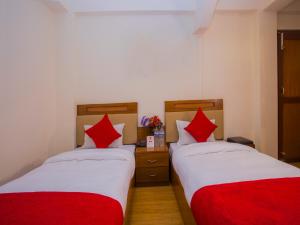 Letto o letti in una camera di Durbar Guest House