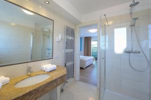 Koupelna v ubytování Grand Hotel Playa