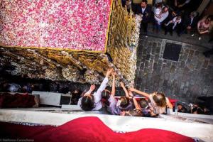 a group of people on a stage with their hands in the air at Bajo Gerona in Seville