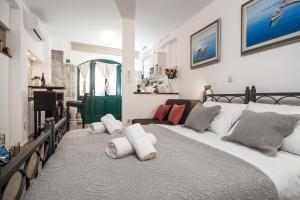 מיטה או מיטות בחדר ב-Apartments Villa Cambi