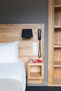 Postel nebo postele na pokoji v ubytování Mon Hotel à Gap