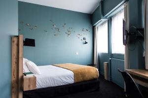 Postel nebo postele na pokoji v ubytování Mon Hotel à Gap