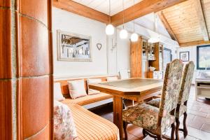Posezení v ubytování Chalet Zentral Bach by A-Appartments + 15 fotografií