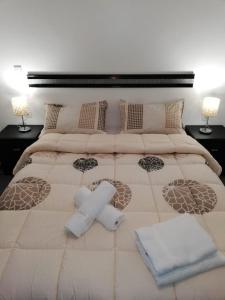Postel nebo postele na pokoji v ubytování Appart Hotel Tanger Paname
